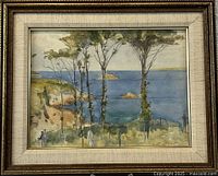 Front view of framed watercolour painting showing coastal landscape with trees and ocean, signed by Anthony Stevens