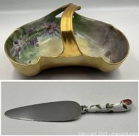 Hand-painted floral Limoges sweets dish with gold handle showing detailed floral design and color