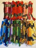 All 50 skeins laid out by colour family