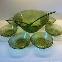 Full set: large bowl, six small bowls, two servers