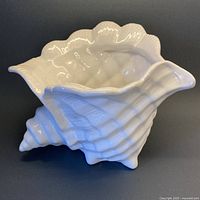 Full view of white ceramic shell planter