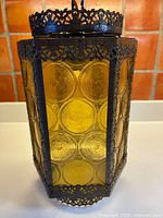 Full view of hexagonal amber glass ceiling light