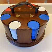 Full view of wooden poker chip carousel loaded with chips