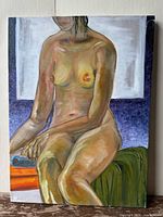 Front view of the original oil painting on canvas of seated nude female figure, showing part of the figure from upper chest to legs on a multicolored background.