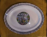 Oval large serving plate featuring Royal Albert Silver Birch pattern with landscape scene in center and textured birch bark style rim.