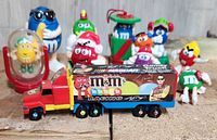Front view of the M&M's collectible figurines and Kyle Busch NASCAR M&M's candy truck