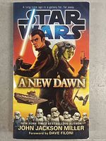 Front cover of Star Wars: A New Dawn showing main characters and title.