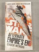 Front cover of Star Wars Aftermath Empire's End book showing spaceship and title.