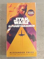 Front cover of Star Wars Alphabet Squadron book showing main illustrated character and title