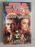 Front cover of hardcover book showing title, author R.A. Salvatore, and character images from Star Wars Episode II Attack of the Clones.