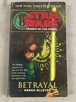 Front cover of Star Wars Legacy of the Force: Betrayal hardcover book showing Luke Skywalker and lightsaber graphic