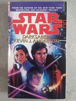 Front cover of Star Wars Darksaber book featuring characters and title.