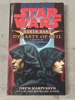 Front cover of Star Wars: Darth Bane - Dynasty of Evil paperback book showing title, author, and artwork.