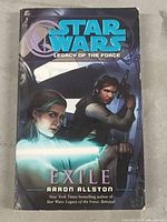 Front cover showing the Star Wars Legacy of the Force Exile book cover with character artwork