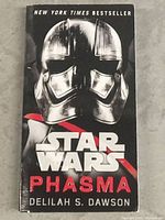 Front cover of the Star Wars Phasma paperback showing the helmet image and title text.