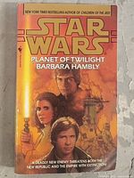 Front cover of Star Wars Planet of Twilight book showing title, author Barbara Hambly, and character artwork