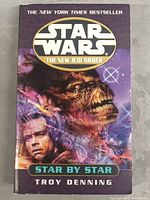 Front cover of Star Wars: Star by Star paperback showing title, author, series, and illustrated characters.