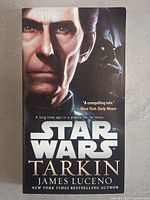 Front cover of Star Wars Tarkin hardcover book showing artwork of Tarkin and Darth Vader with title and author name.