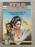 Front cover of the hardcover book showing Princess Leia and Han Solo with Star Wars text and author name.