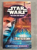 Front cover of the book Star Wars The New Jedi Order: Traitor showing artwork and title.