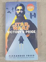 Front cover of the Star Wars Victory's Price book showing title, author and Star Wars themed artwork.