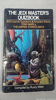 Front cover of The Jedi Master's Quizbook showing Yoda illustration and title details.