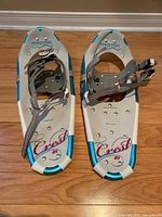 Top view of both Powderidge Crest 21 women's snowshoes showing the overall design and bindings.