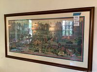 Framed art print showing full artwork and frame from front view with reflections.