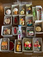 Overview of all ornaments laid out in original boxes