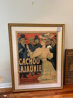 Front view of framed Cachou Lajaunie poster showing full artwork and frame