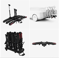 Rack folded upright showing three composite wheel beds and two telescoping bike attachment arms