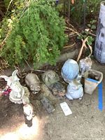 All ten garden ornaments arranged outdoors