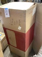 Sealed Balsam Hill branded box containing tree