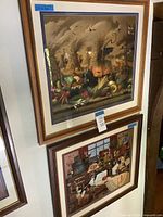 Two framed Wysocki prints hung on wall, full view