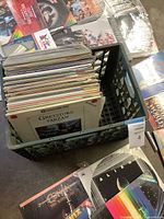 Crate packed with numerous LaserDiscs visible including Greystoke and Alien