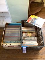 Overview of two crates of books and magazines