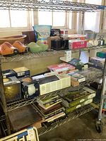 Full shelving unit with majority of items visible