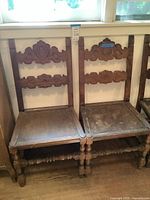 Front view of both chairs showing full design