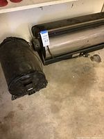 Rotomaster RM-1 and Speedo dryers on floor