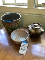 Planter, bowl, and lidded crock grouped