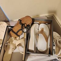 Four pairs women's size 10 sandals in boxes and out, showing styles and condition