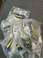 10 units of KTBRPX 19 C angle 1/4 turn ball valves in clear plastic packaging with labels