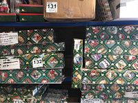 Shelf showing multiple Old World Christmas ornament boxes