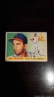 Front of 1955 Topps Joseph Filmore Frazier baseball card showing player images and team logo