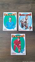 Front of 3 hockey cards from 1971 OPC set featuring Terry Crisp (Blues), Pat Stapleton (Black Hawks), Garry Unger (Blues)