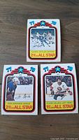 Front side of three 1978 OPC All Star hockey cards showing player images and details.