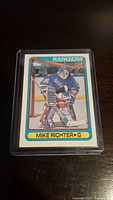 Front of Mike Richter hockey card showing him in goalie gear with New York Rangers uniform, card number 330