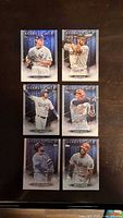 Six MLB baseball cards front side, featuring Gerrit Cole, Kris Bryant, Cody Bellinger, Yasiel Puig, George Springer, and Bryce Harper in their team uniforms with Stars of MLB title.