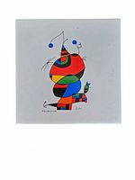 Front of ceramic tile with colorful abstract artwork by Joan Miro.