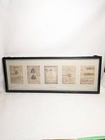 Frontal view of the framed print showing five DaVinci-style sketches in a black frame, displaying peeling on the top right corner of the frame.
